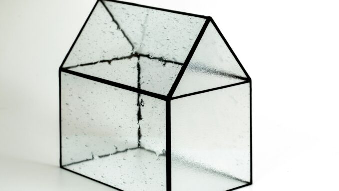 Transparent model of a building illustrating the trend towards open-source AI and the need for increased transparency around the development of artificial intelligence models to build trust, reduce risk, and improve security.