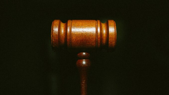Photo of a gavel as OpenAI launches a legal counteroffensive against one of its co-founders, Elon Musk, and his competing AI venture, xAI.